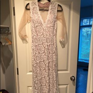 Jovani white and nude lace gown with mesh sleeves